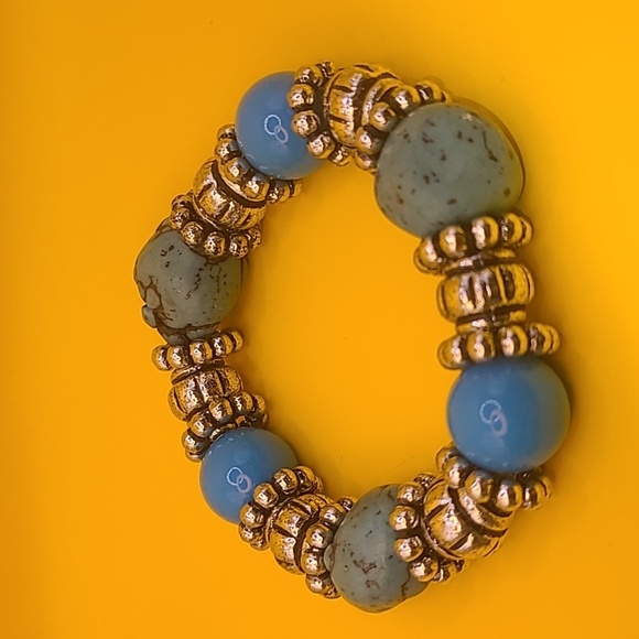 Silver toned and faux turquoise stretch bracelet - Picture 2 of 3